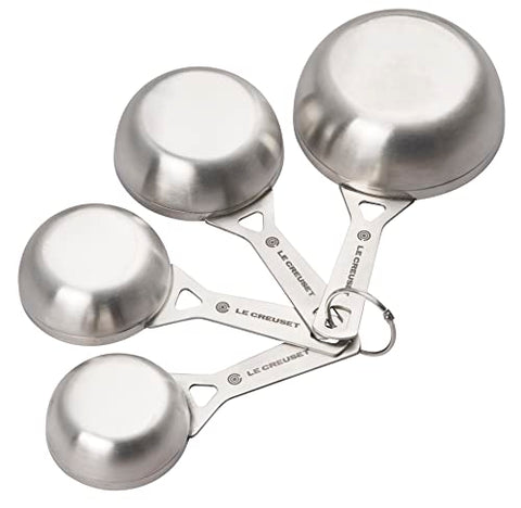 Le Creuset stainless steel measuring cups closeup handle for comfortable scooping