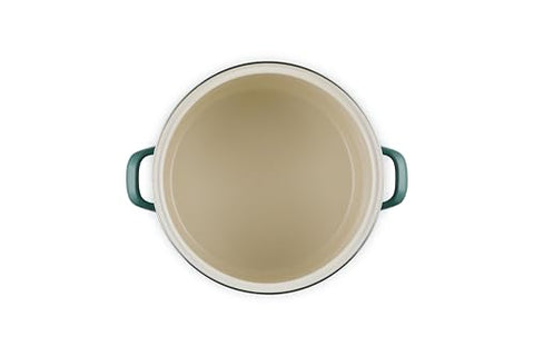 Le Creuset stockpot rim detail in Artichaut emphasizing durable stainless rim