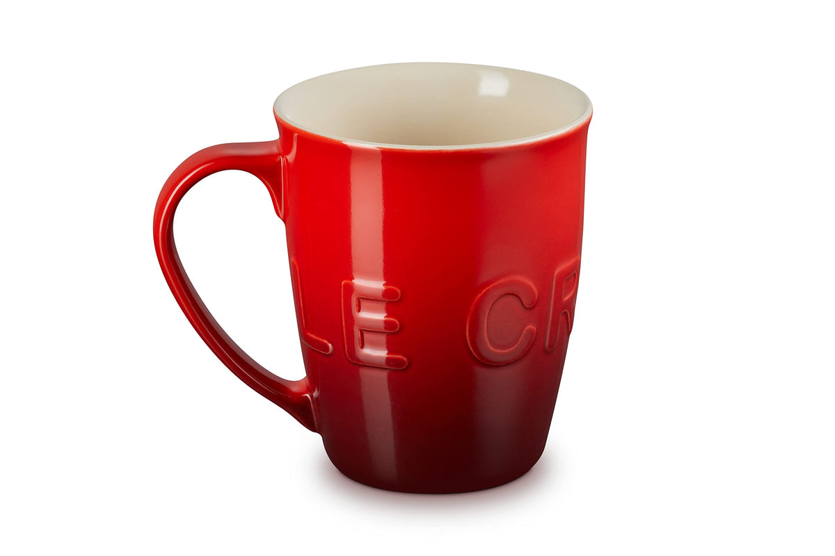 Le Creuset 20 oz Logo Mug in Cerise with wrap-around branding and generous capacity