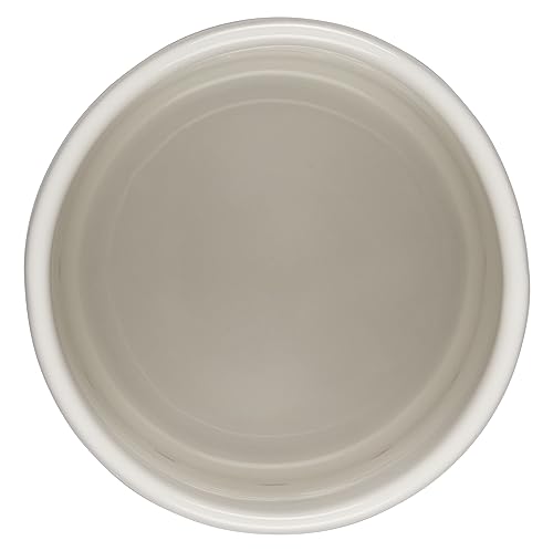 Le Creuset stoneware close-up, dense material blocks moisture for storage.