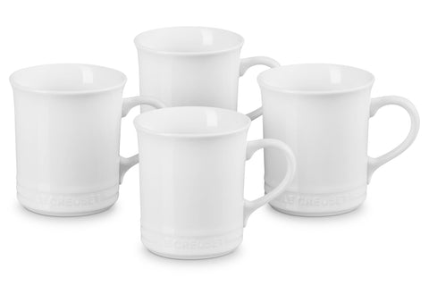 Le Creuset stoneware mugs 4 white front view with sturdy handles for daily coffee.