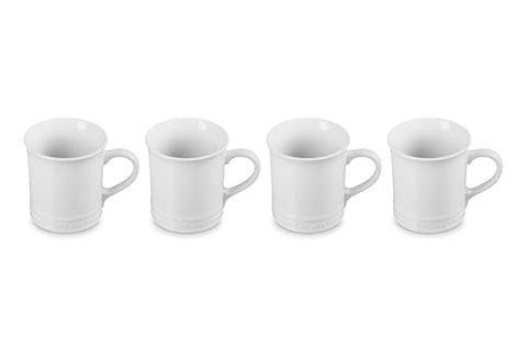 Le Creuset stoneware mugs 4 white side angle highlights even glaze and comfortable grip.