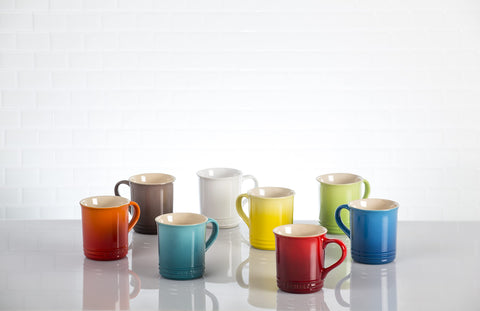 Le Creuset Cerise mug graphic indicating dishwasher-safe ease for busy kitchens