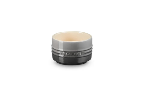 Le Creuset oyster-glazed stoneware ramekin ready for individual desserts and elegant presentation.