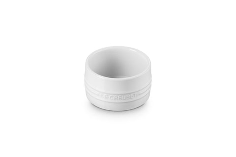 Le Creuset white round stoneware ramekin, assembled for elegant individual servings.