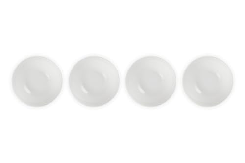 Le Creuset stoneware texture closeup emphasizes durable surface for daily use.