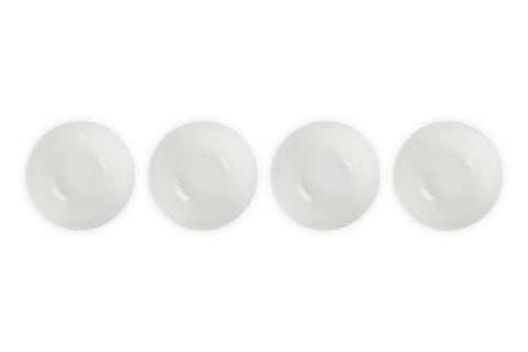 Le Creuset stoneware texture closeup emphasizes durable surface for daily use.
