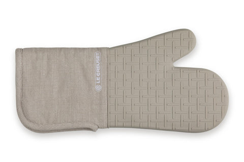 Le Creuset Textile Oven Mitt 15-inch sable exterior with secure silicone grip for hot pots