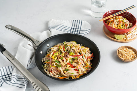 Le Creuset pan suitable for oven use up to 500°F with all cooktops