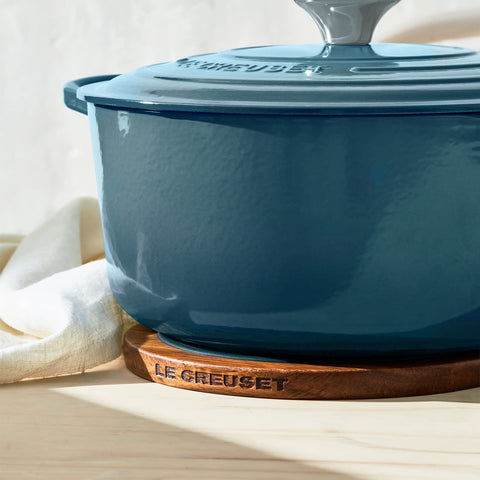 Le Creuset trivet magnet underside attaching to cookware for easy serving