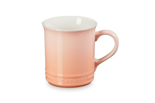 Le Creuset Vancouver mug with Peche glaze highlights vibrant color and smooth finish.