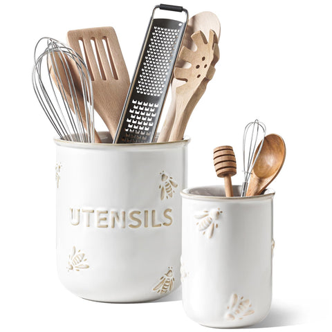 LE TAUCI large bee-embossed utensil holder in Arctic White keeps spatulas organized.
