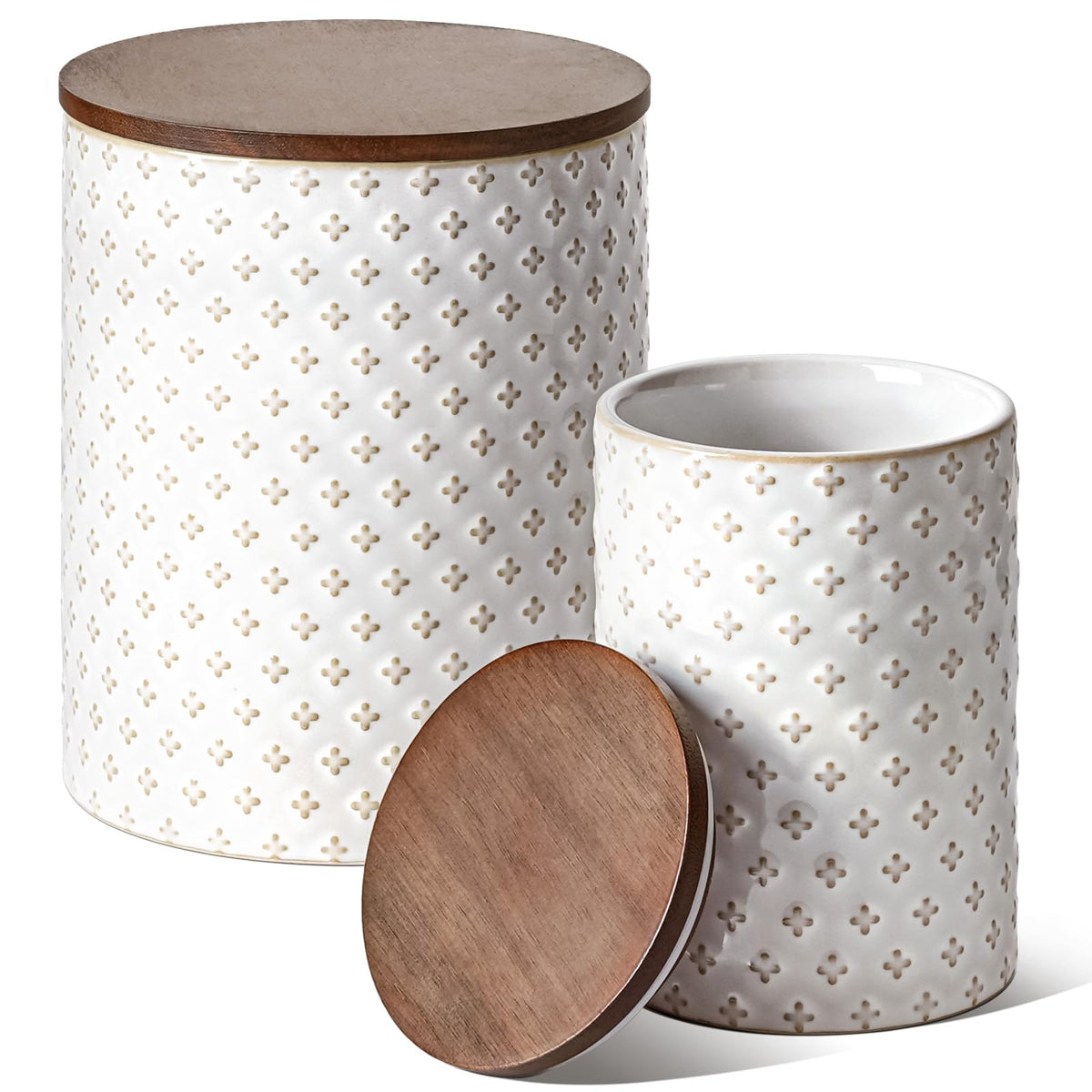 LE TAUCI ceramic containers set in embossed white glaze for stylish pantry storage.