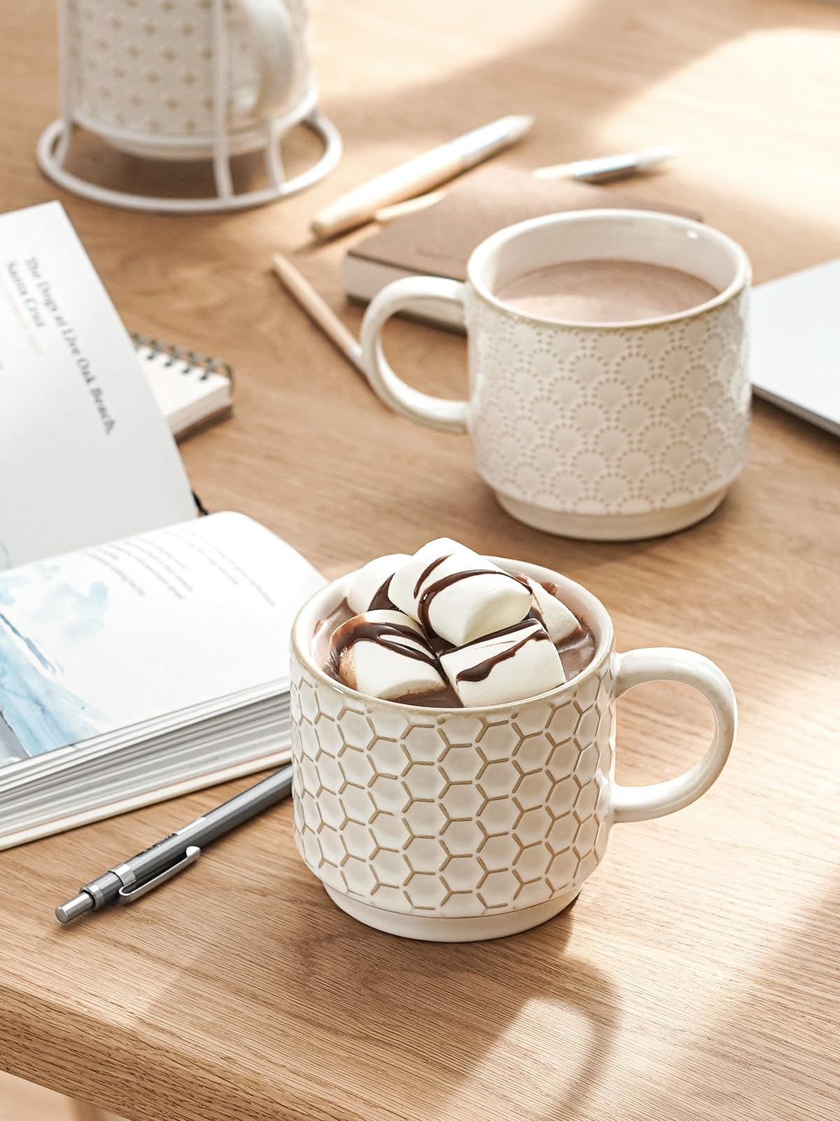 LE TAUCI embossed ceramic cups featuring four patterns for elegant table presence