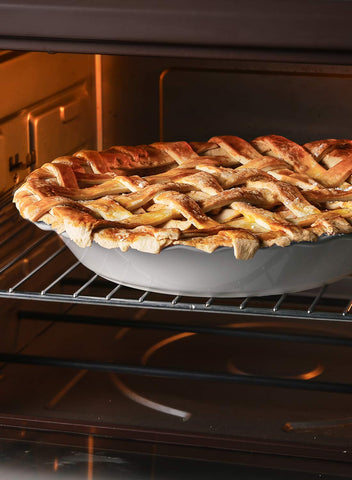 LE TAUCI pie pan yields a crisp exterior on pies and quiches.
