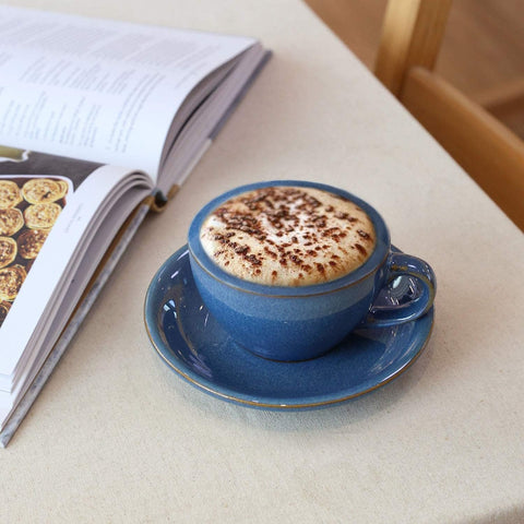 LE TAUCI saucered cups keep utensils within reach during enjoyment.