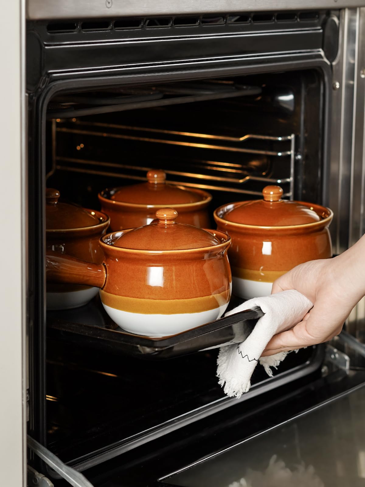 LE TAUCI stackable 4-pack keeps cupboards organized for gatherings.