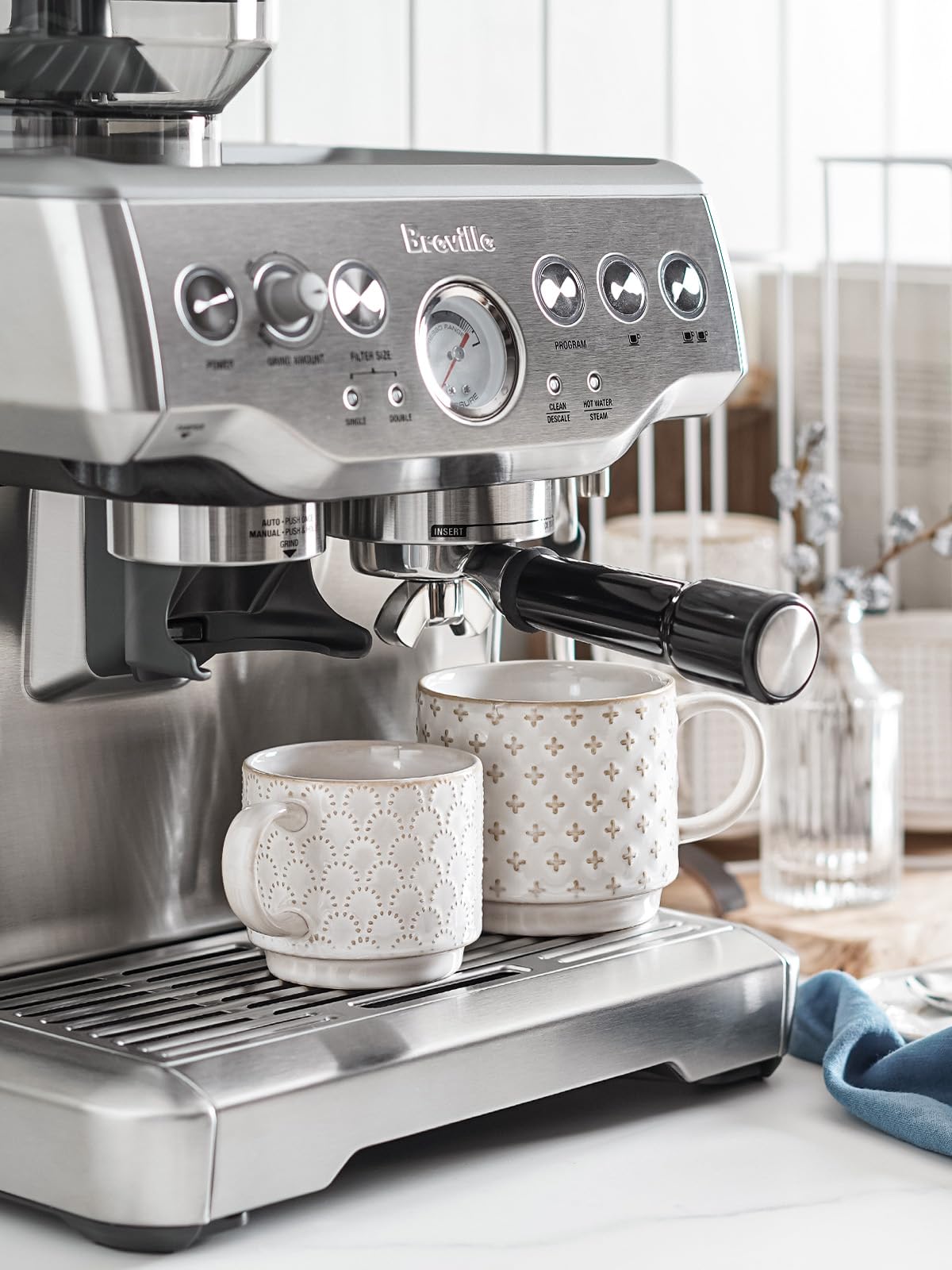 LE TAUCI stackable mugs on a metal stand saving shelf space