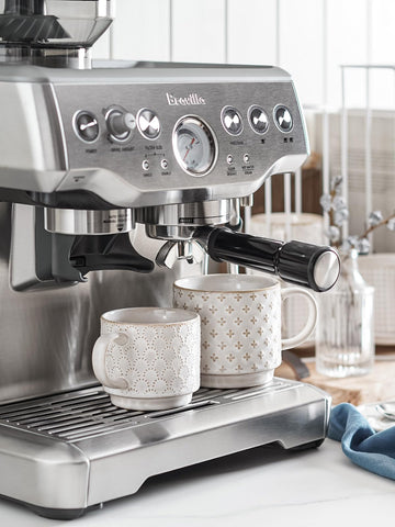 LE TAUCI stackable mugs on a metal stand saving shelf space