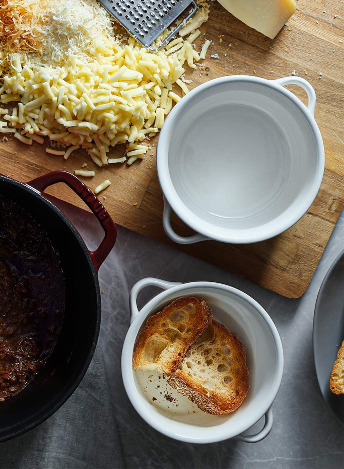 LE TAUCI stackable white bowls save cabinet space.