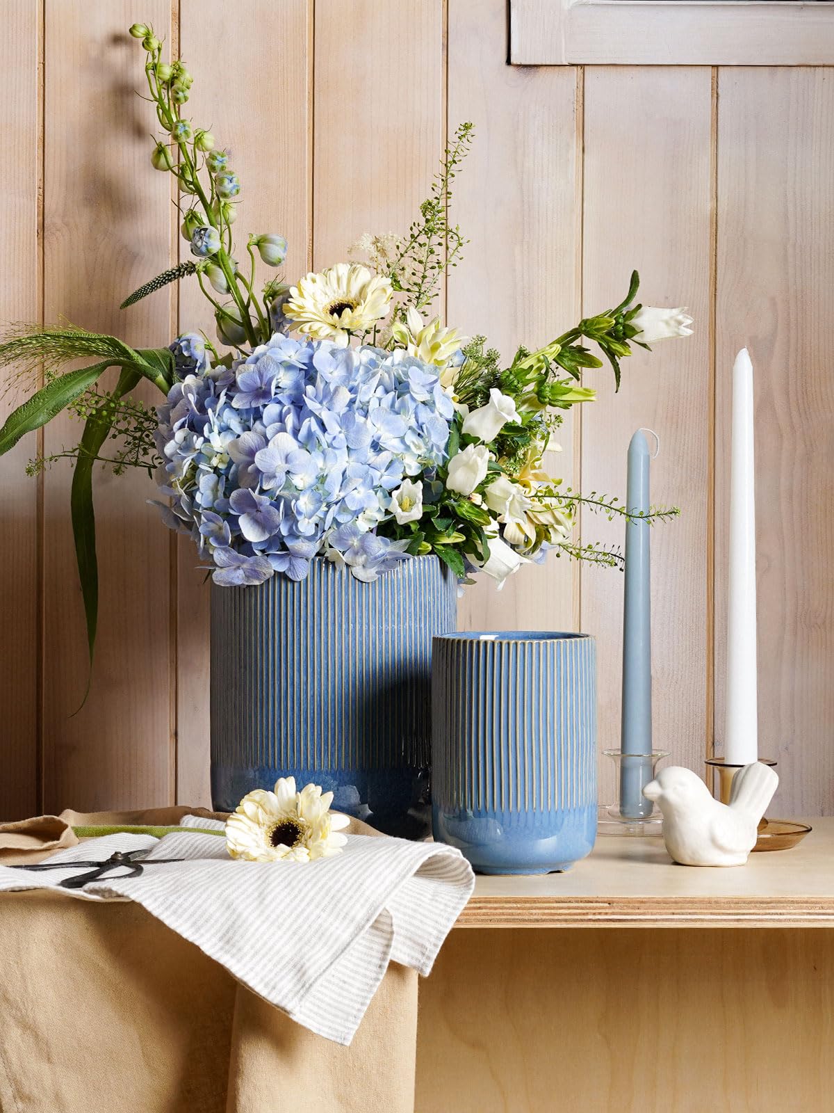 LE TAUCI utensil holder on countertop provides easy access.
