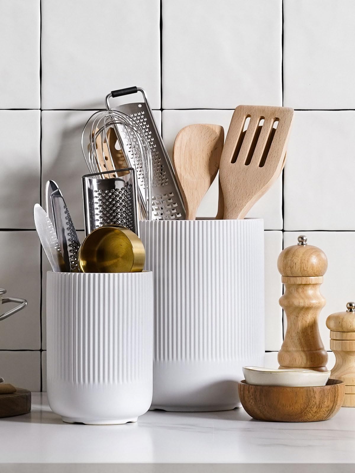 LE TAUCI utensil holder doubles as a chic vase for hair tools or fresh flowers