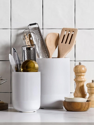 LE TAUCI utensil holder doubles as a chic vase for hair tools or fresh flowers