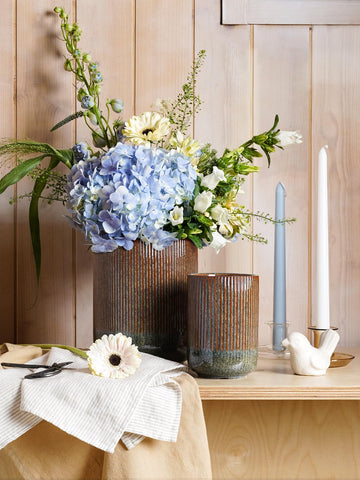 LE TAUCI multi-use holder doubles as vase or storage for small items.