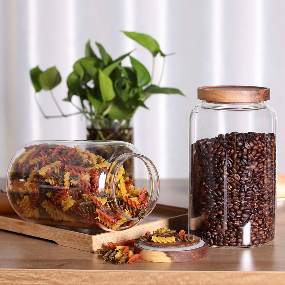 Leaves and Trees Y clear kitchen jars for flour sugar rice and baking ingredients.
