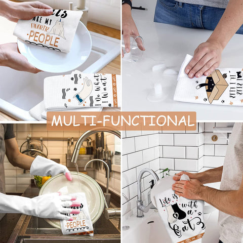 Lebsitey cat kitchen towels hanging on oven handle for quick access.
