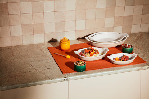 Le Creuset glaze resists chips and stains, preserving vibrant color.
