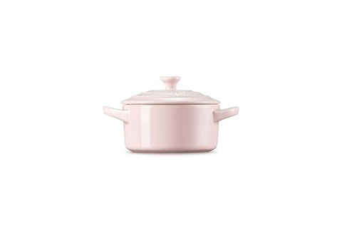 Le Creuset cocotte opened to reveal smooth nonstick interior