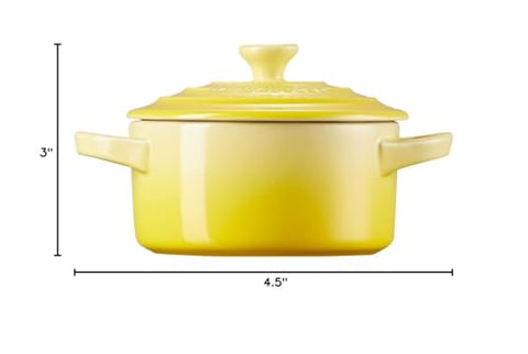 Le Creuset Soleil 8oz cocotte bright color enhances kitchen and table decor.