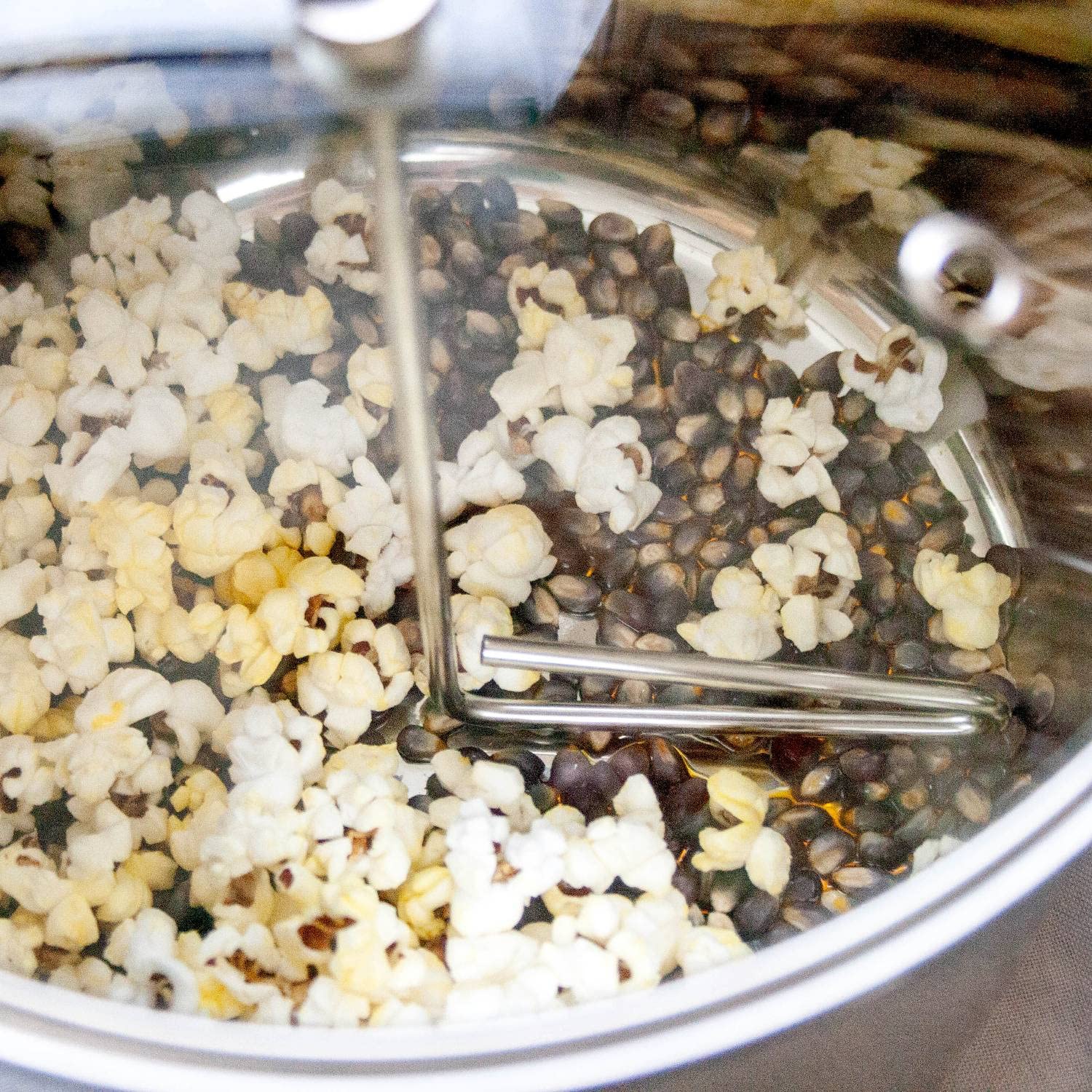 Lehman's lid steam holes promote moisture escape for crispy popcorn