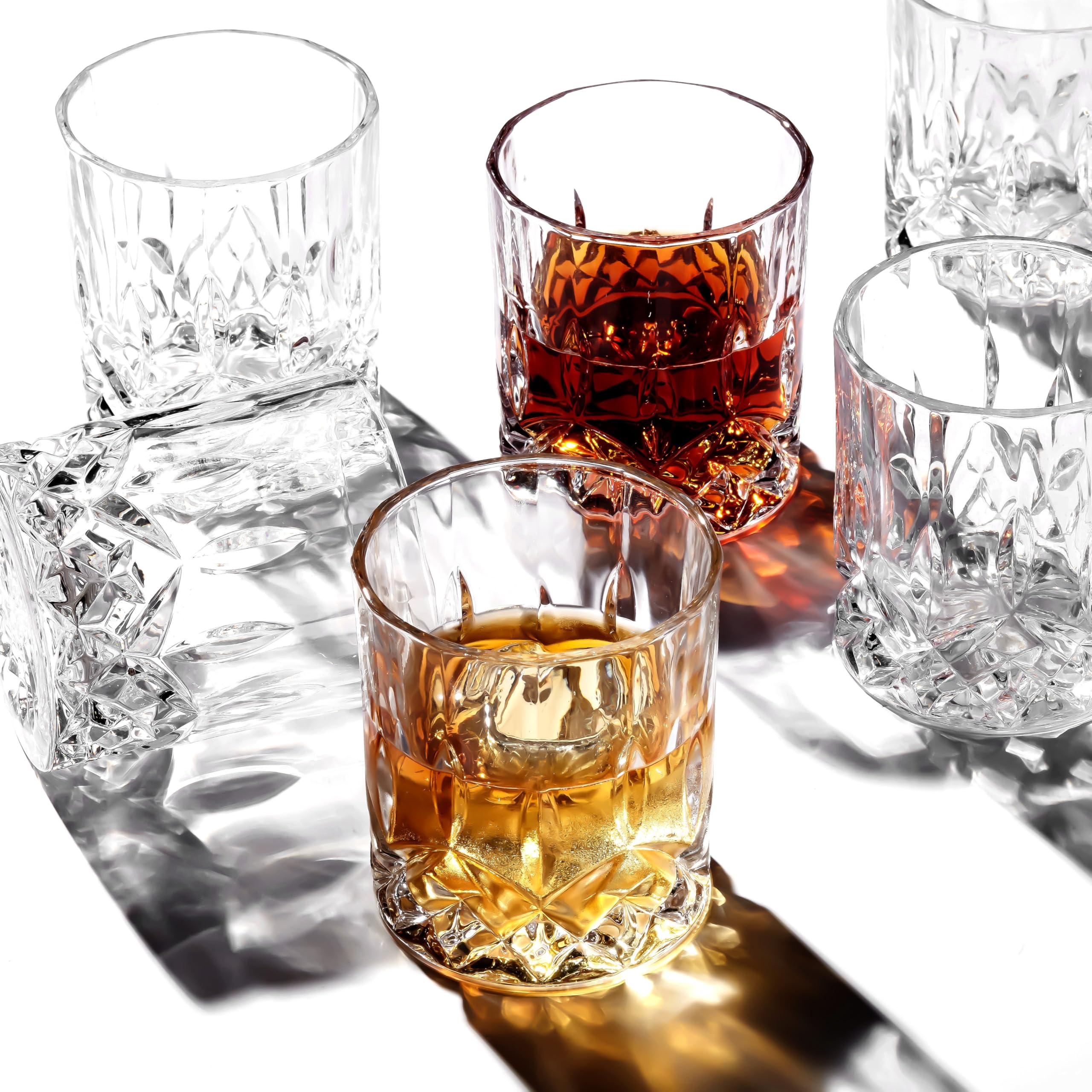 LEMONSODA glasses with ice and bourbon, showcasing clarity and pourable volume.
