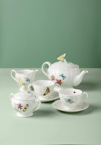 Lenox Butterfly Meadow saucers with floral motif for elegant serving