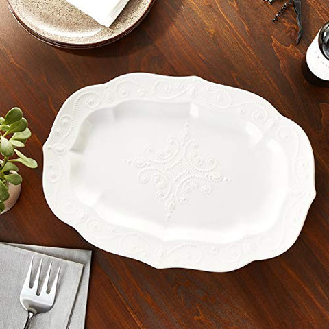 Lenox French Perle white oval platter is microwave safe for quick reheating.