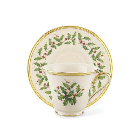 Lenox Holiday Tea Saucer with 24K gold trim enhances holiday service.