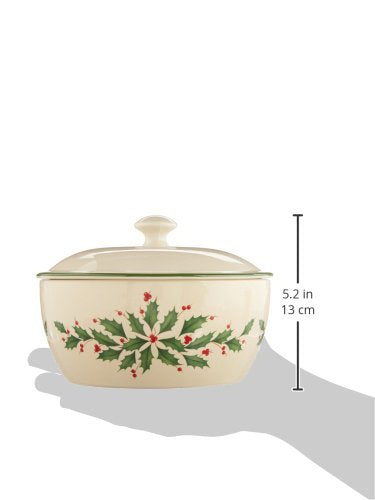 Lenox holly motif porcelain dish adds seasonal charm to table.