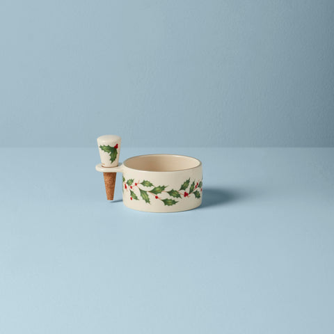 Lenox stopper set resting cork with wine bottle on base for mess-free serving.