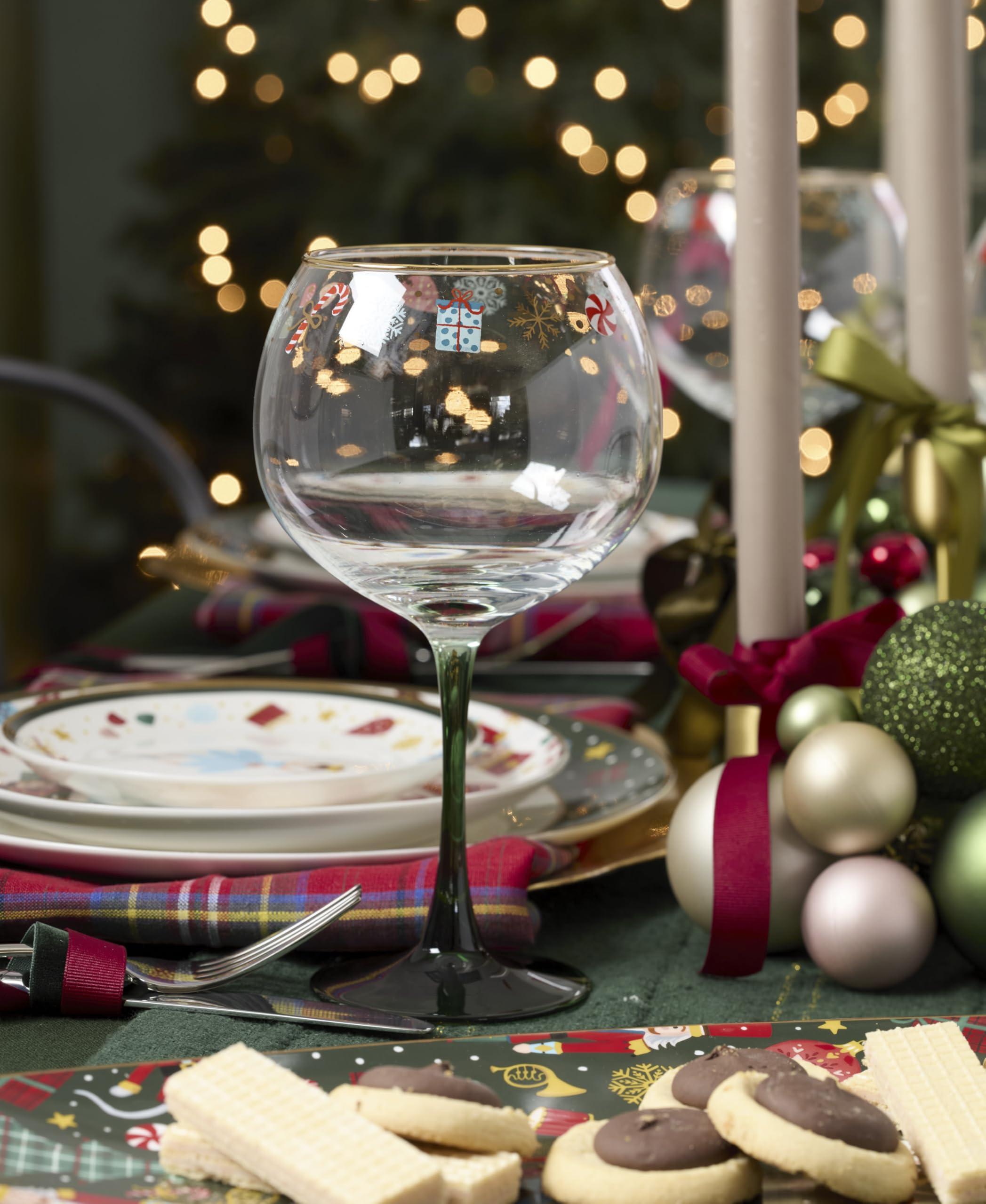 Lenox Nutcracker Ballet balloon wine glass in hand, highlighting festive silhouette.