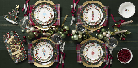 Lenox Nutcracker Ballet porcelain dishware on a festive table.