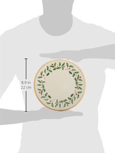 Closeup of Lenox porcelain reveals holly-berry details for seasonal charm.