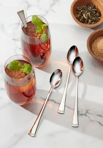 Lenox Portola iced teaspoons on a dining table showing mirror finish and table setting