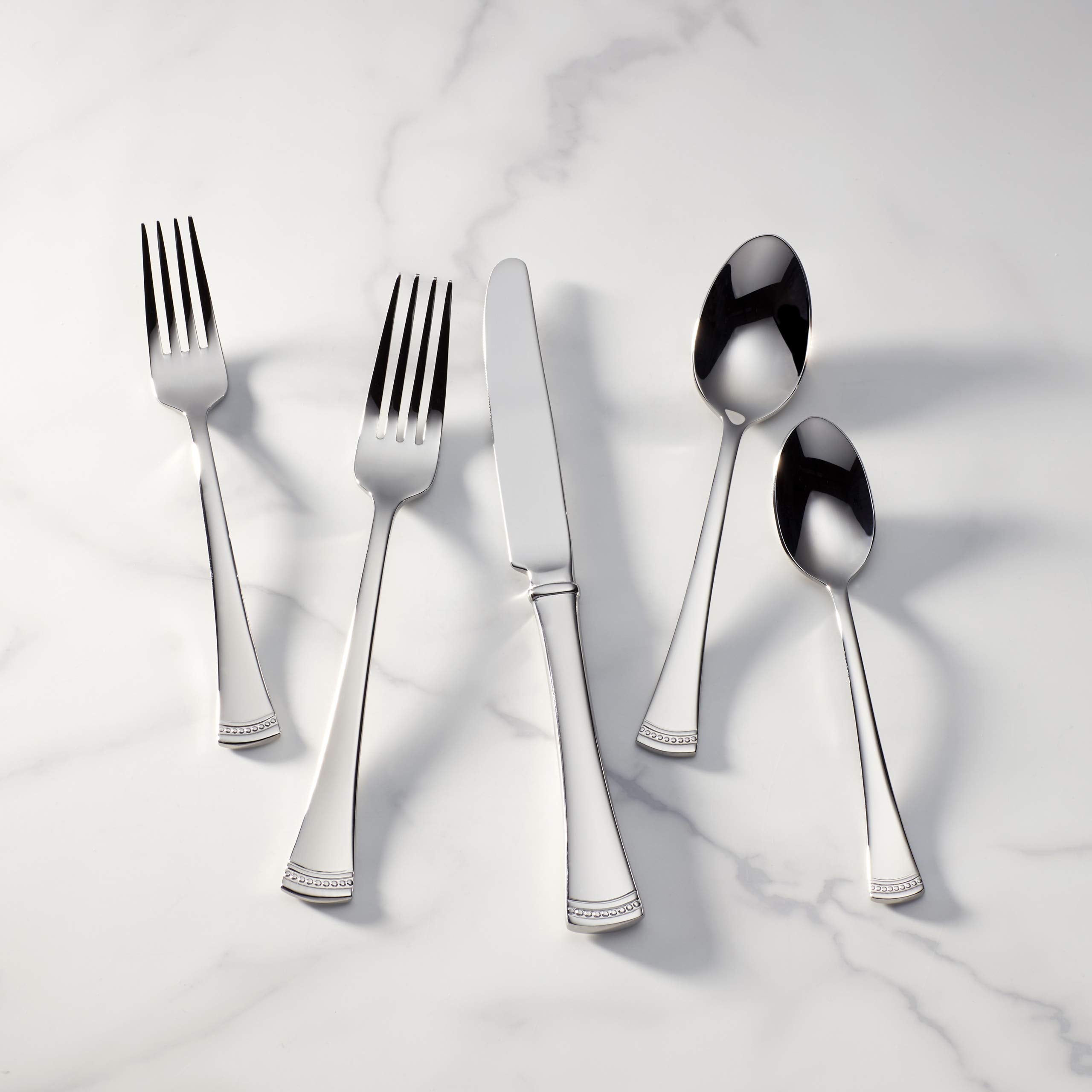 Service for 12 with Portola flatware and 5-piece serving set