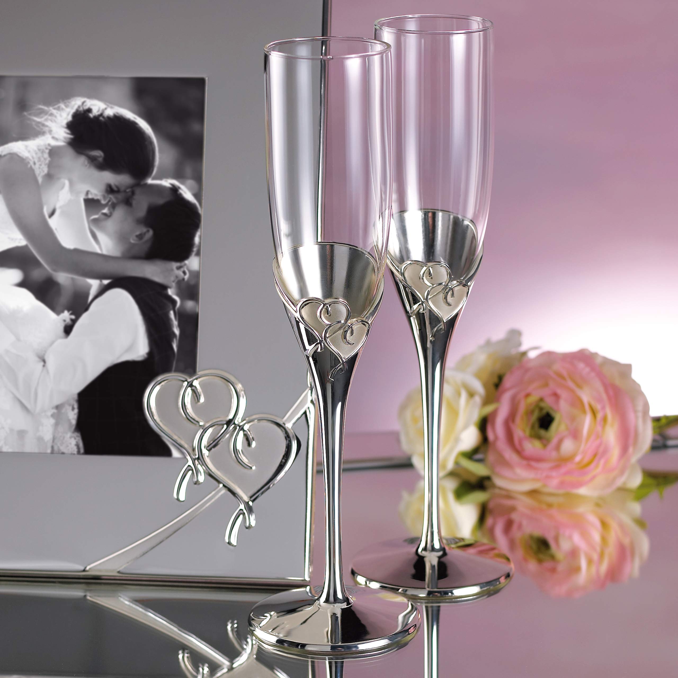 Close-up of interlaced hearts on Lenox True Love silverplate detail for elegance.