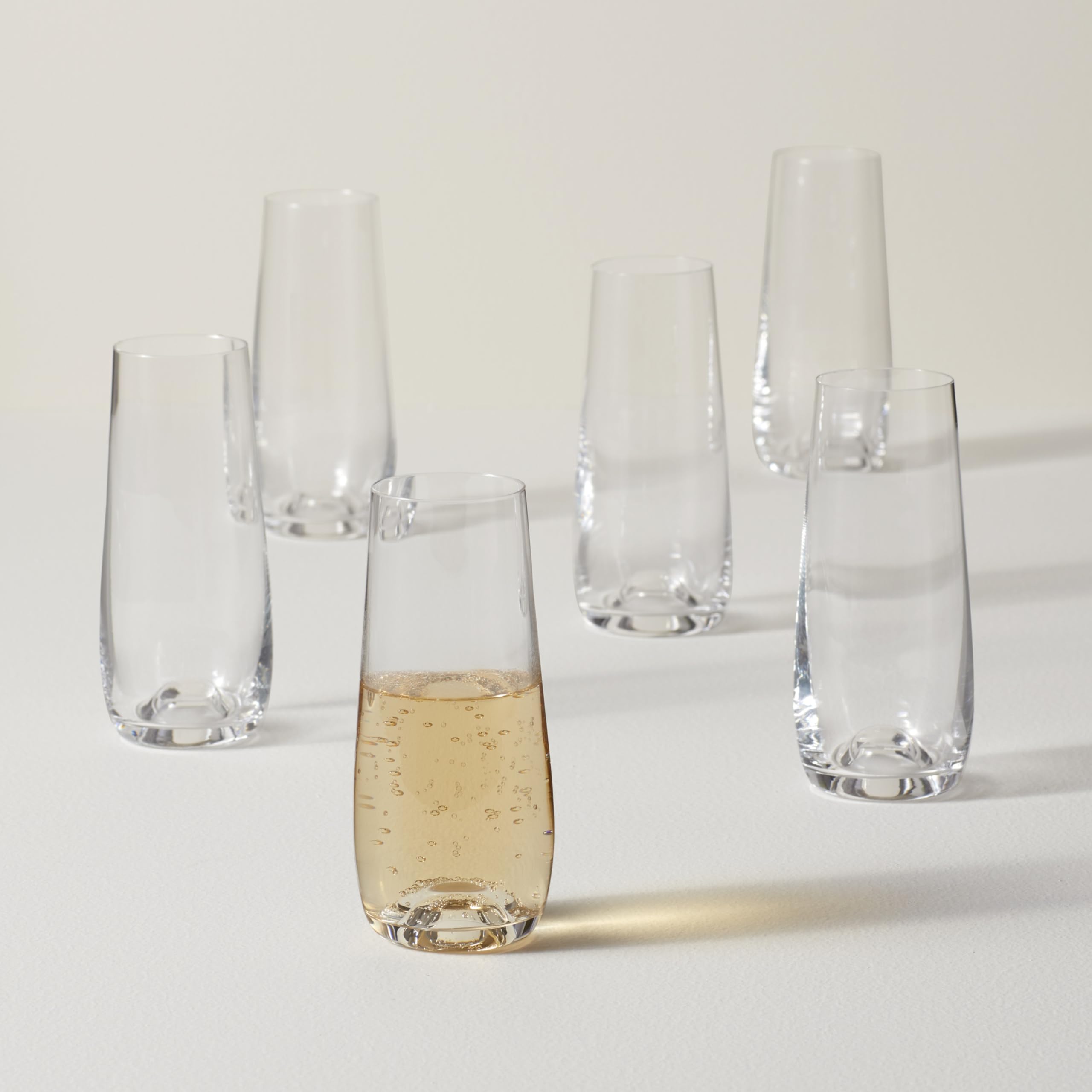 Six 9-ounce Lenox flutes ideal for champagne pours during celebrations