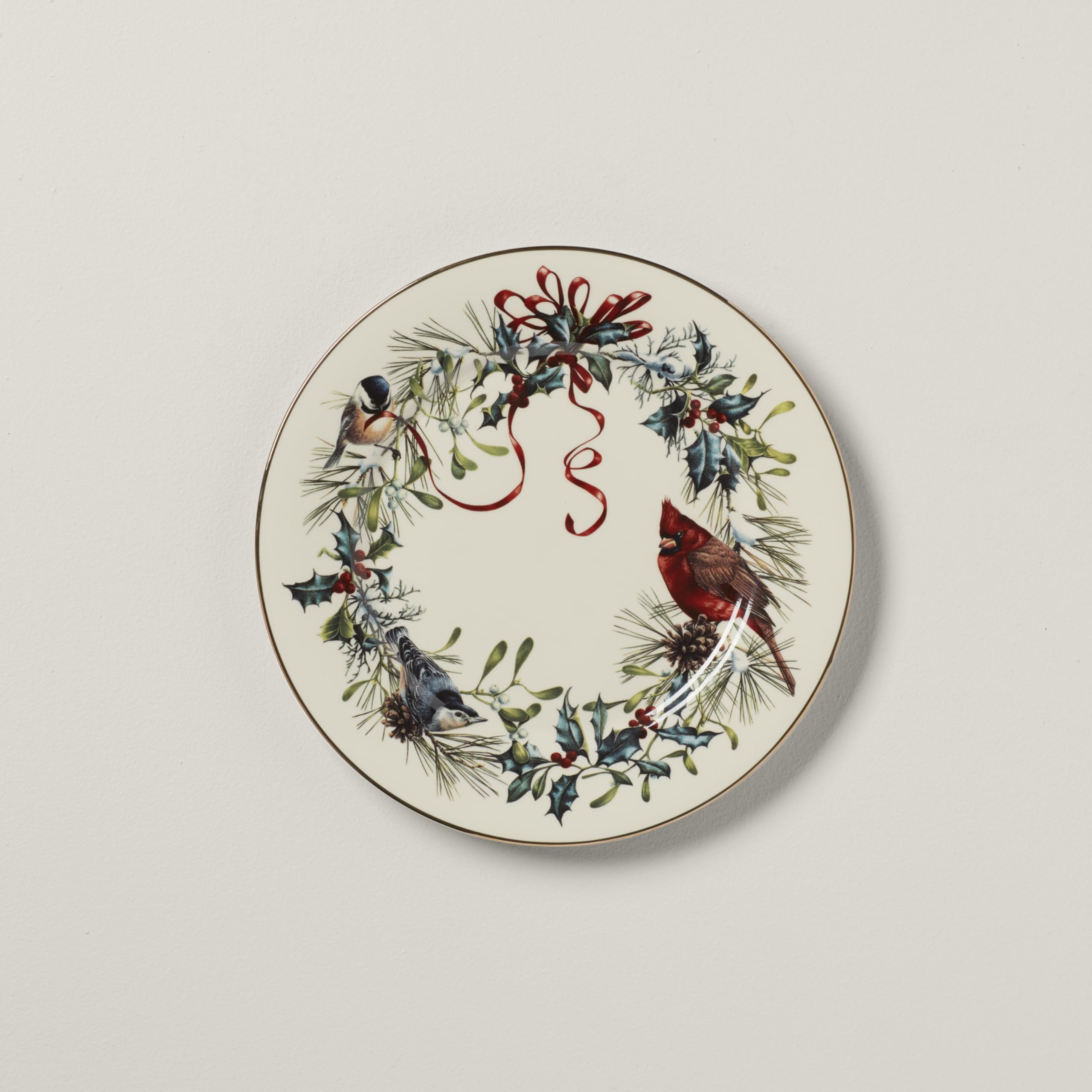 Lenox Winter Greetings plate shown on a holiday table setting for elegant hosting.