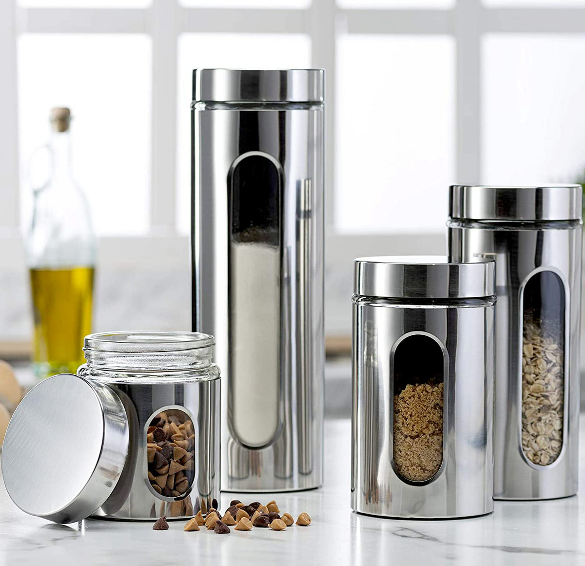 Le'raze four-piece stainless canister set with window for easy ingredient visibility.
