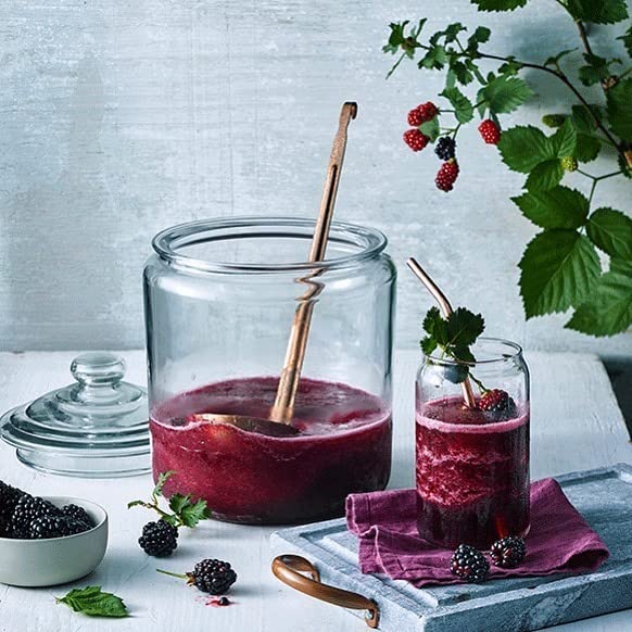 Le'raze kitchen counter organization with clear glass canisters.
